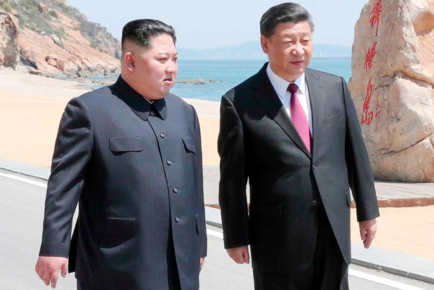 Kim Jong-un dan Xi Jinping...