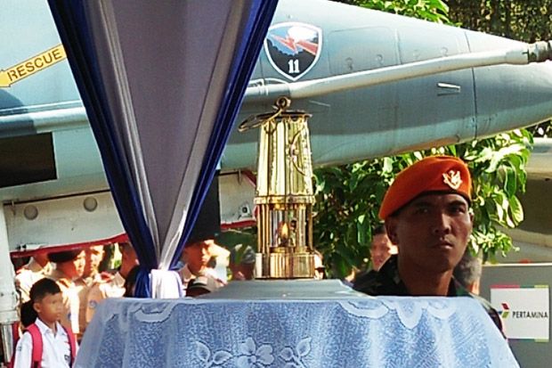 Kirab Api Obor Asian...
