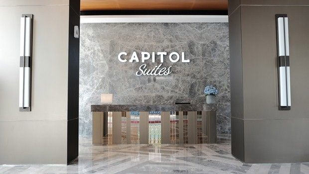 Apartemen Capitol Suites...