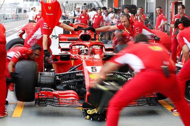 Pembalap Ferrari Sebastian...