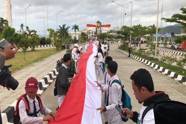 Di Batas Papua Nugini,...