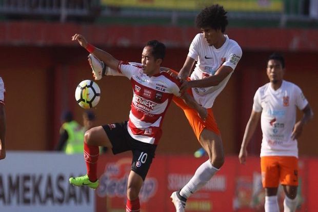 Madura United Telan...
