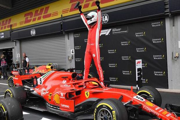 Pembalap Ferrari Sebastian...