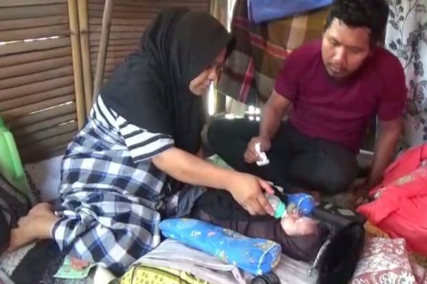 Ibu Melahirkan Anak...