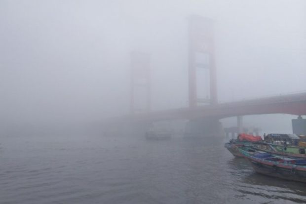 Palembang Diselimuti...