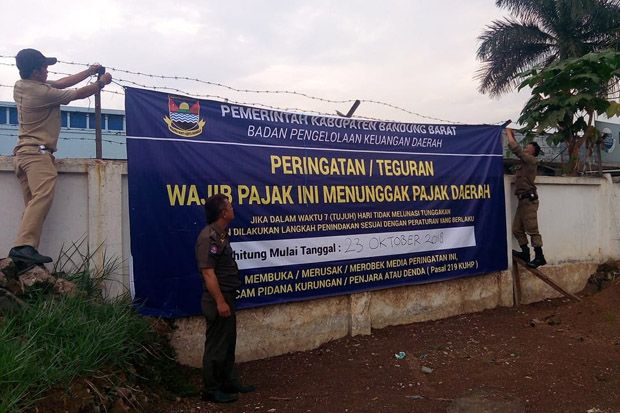 Menunggak Pajak Rp5,1...
