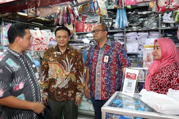 Bank DKI Tambah Buka...