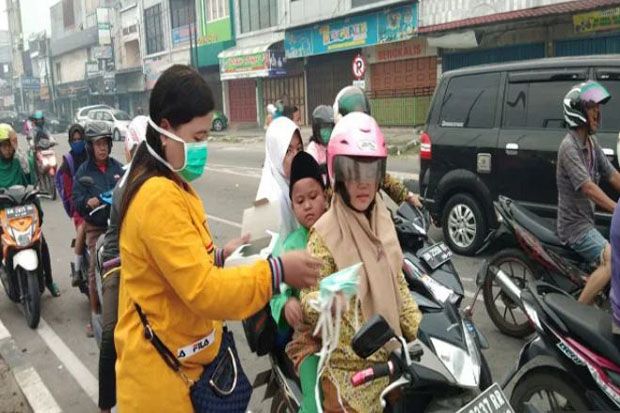 Kabut Asap, Ribuan Warga...