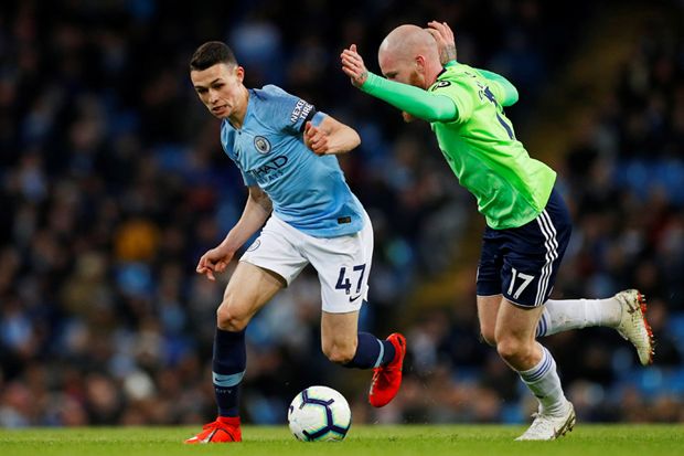 City Lengserkan Liverpool,...