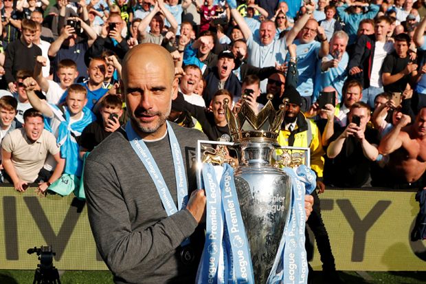 Guardiola Rebut Gelar...