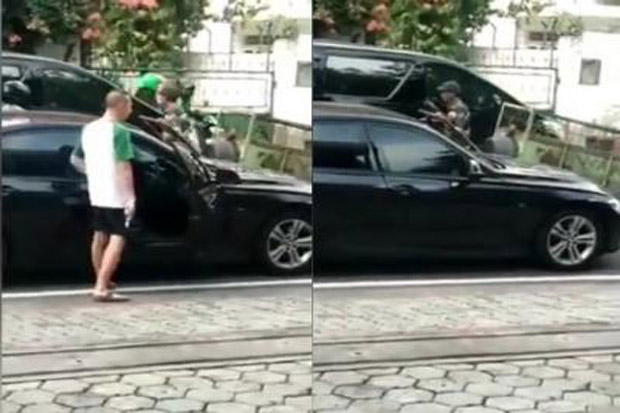 Pengemudi BMW Todongkan...