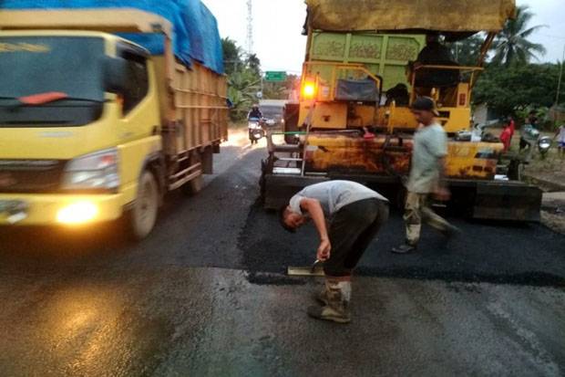 Perbaikan Jalan Ikuti...