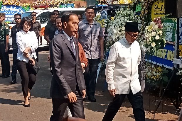 Presiden Jokowi dan...