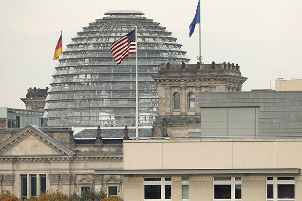 German Lawmakers Urge...