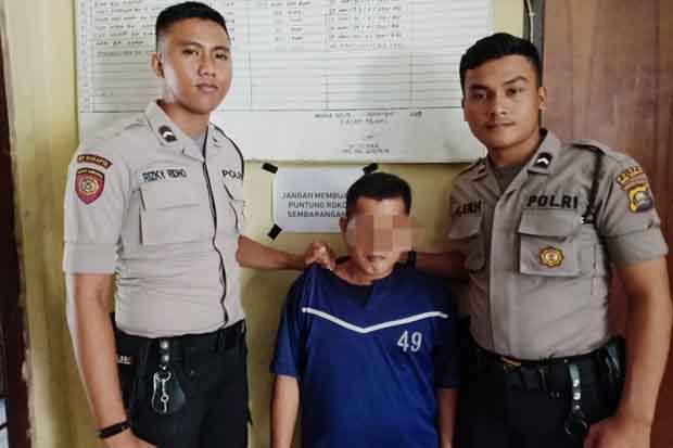 Seorang Pria di Muba...