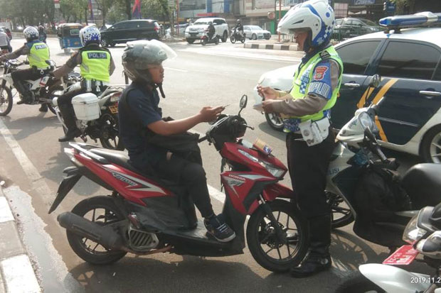 Tilang Tak Efektif,...