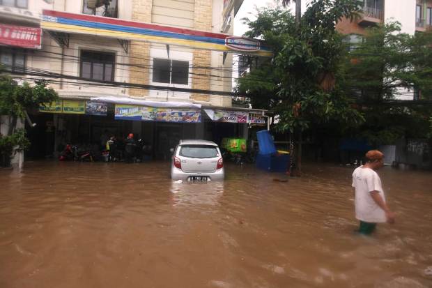 Apindo: Banjir Rugikan...