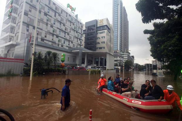 Kerugian Banjir Jakarta...