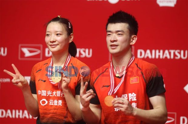 Zheng/Huang Pertahankan...