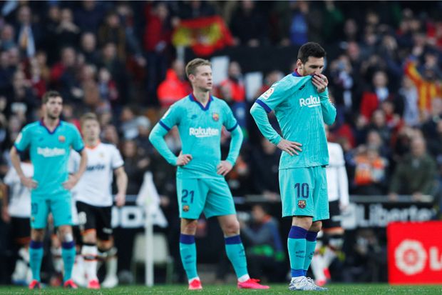 Valencia Kalahkan Barcelona,...