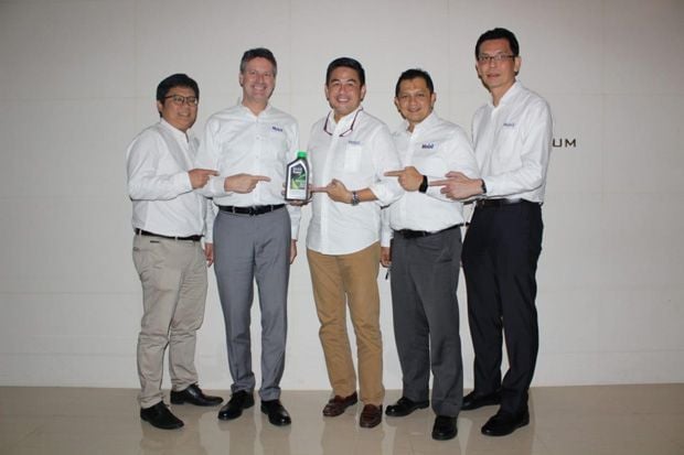 ExxonMobil Gandeng Grab...