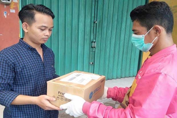 Perusahaan Pengiriman...