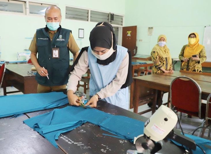 Produksi Baju APD, Dinas...