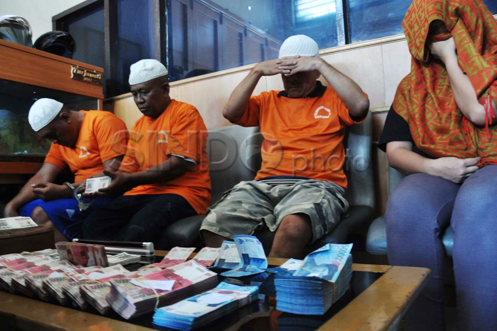 Uang Palsu Rp165 juta