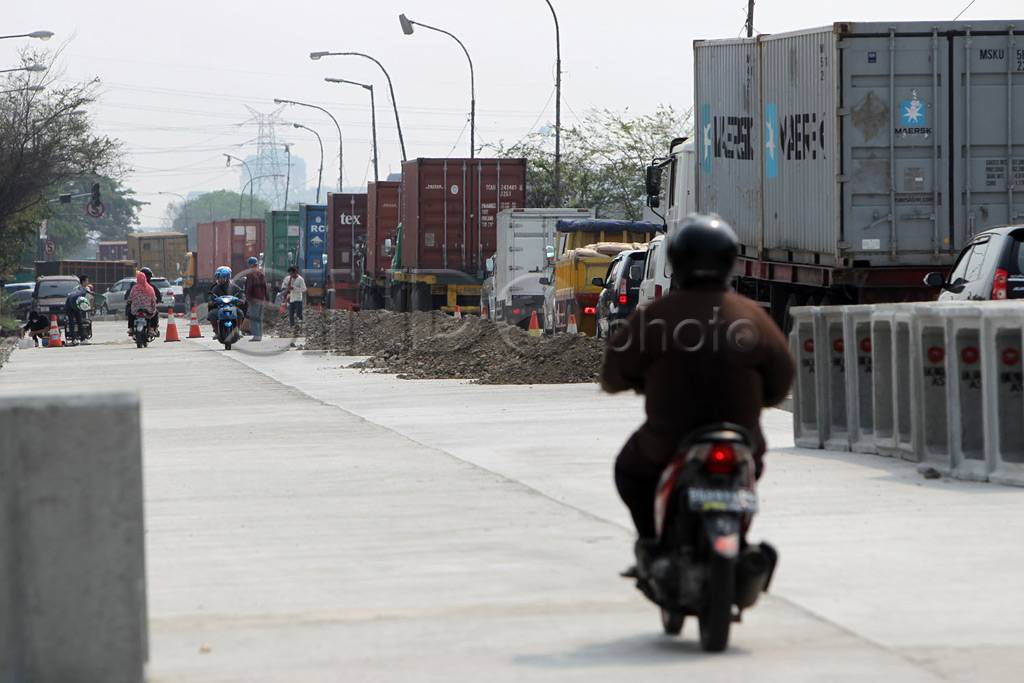 Penebalan Jalan RE Martadinata