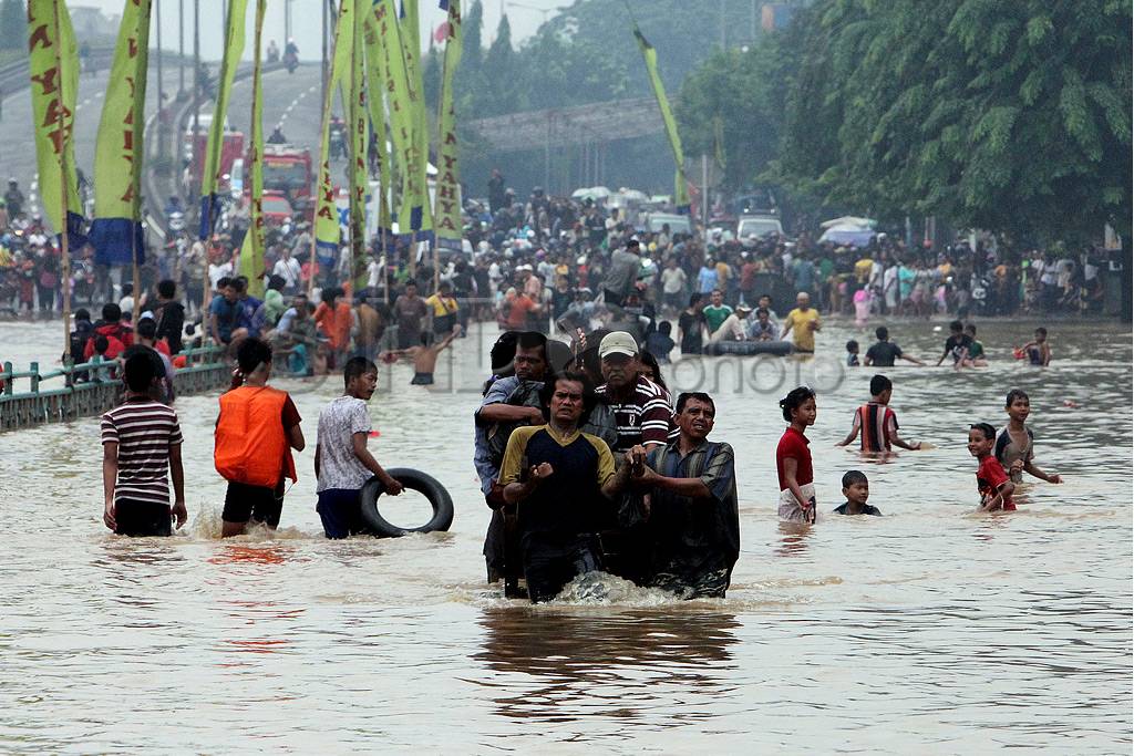 Ciliwung Meluap Akses...