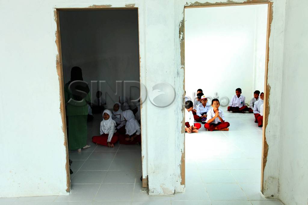 Sekolah menumpang di...