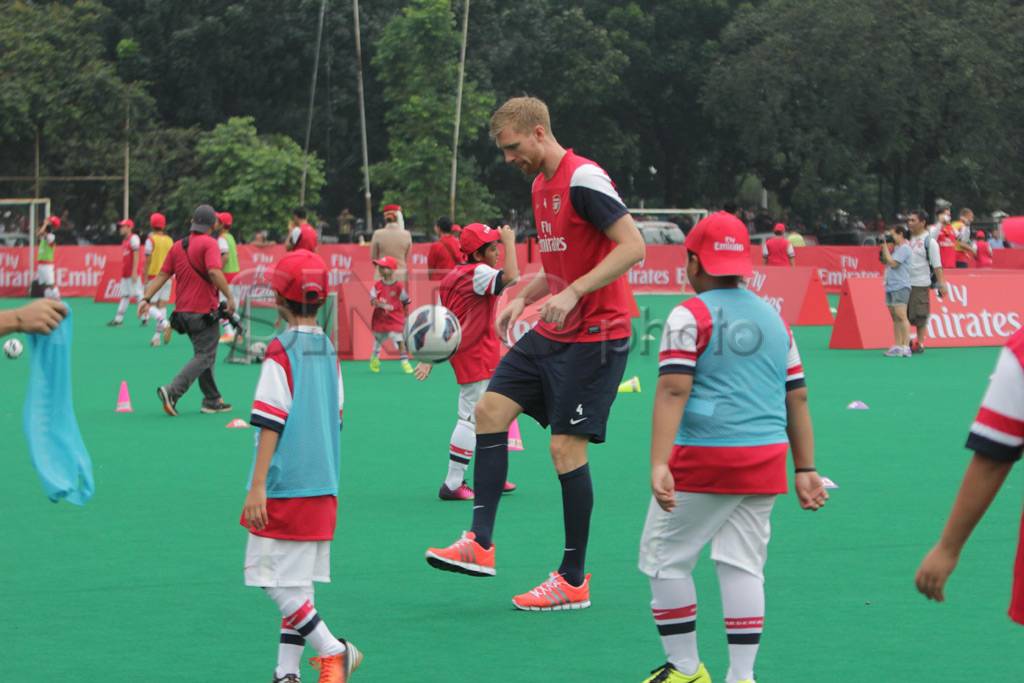 Podolski, Mertesacker,...