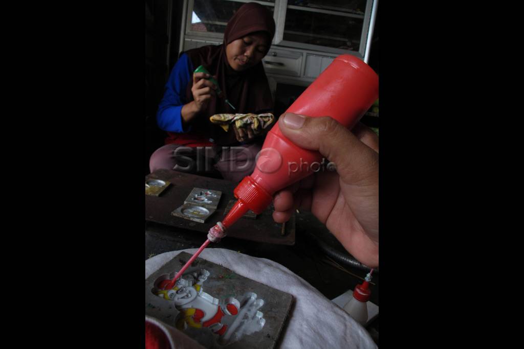 Pembuatan souvenir maskot...