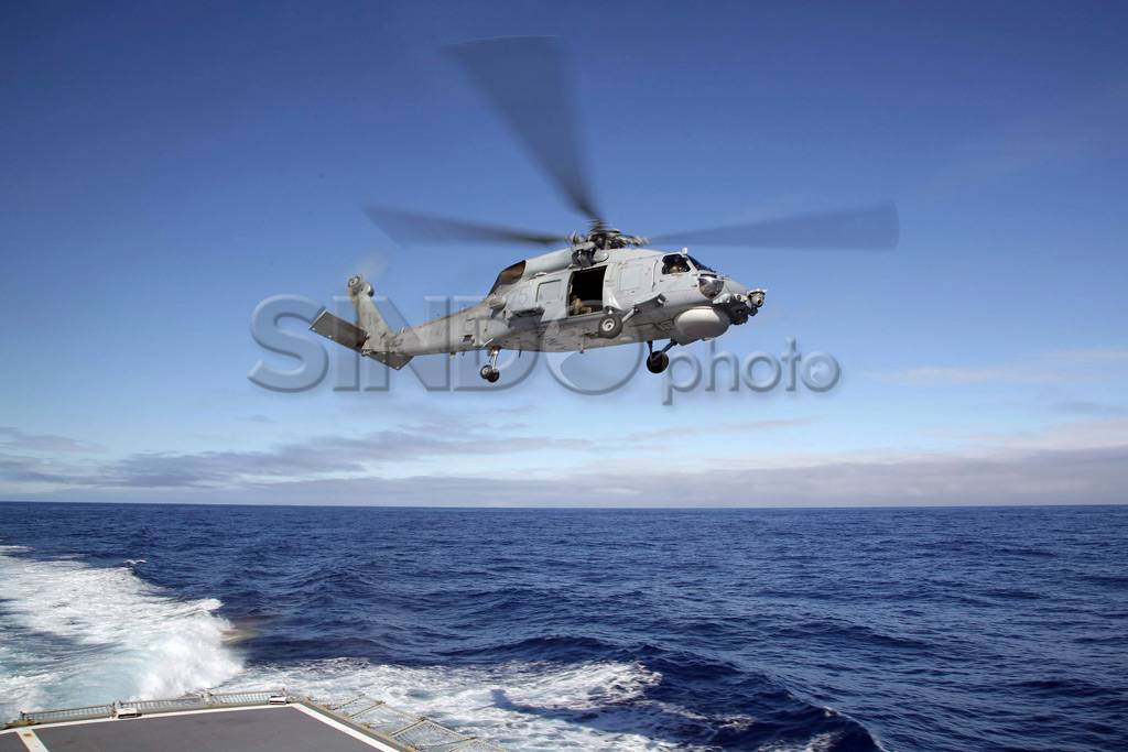 Pencarian MH370 di tengah...
