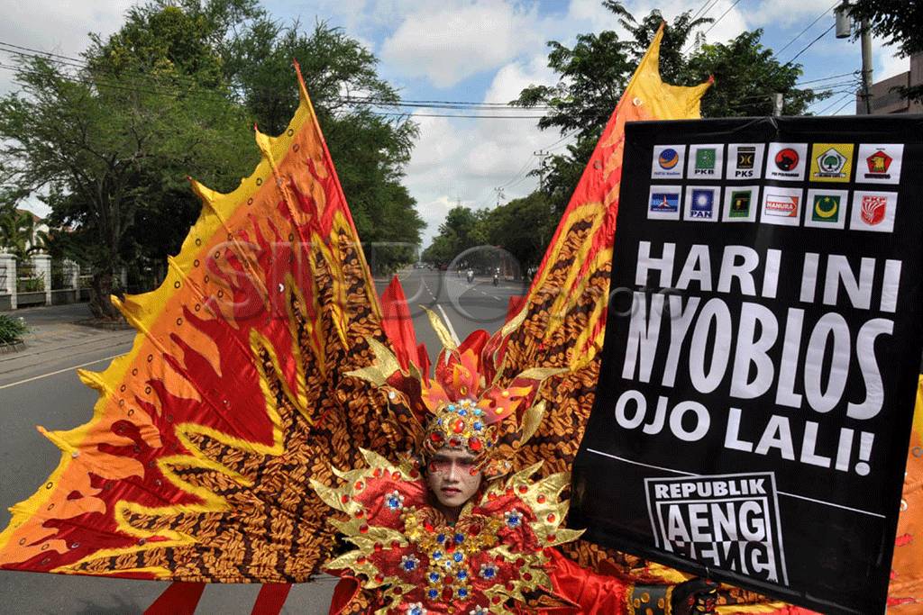 Cara unik ingatkan warga...