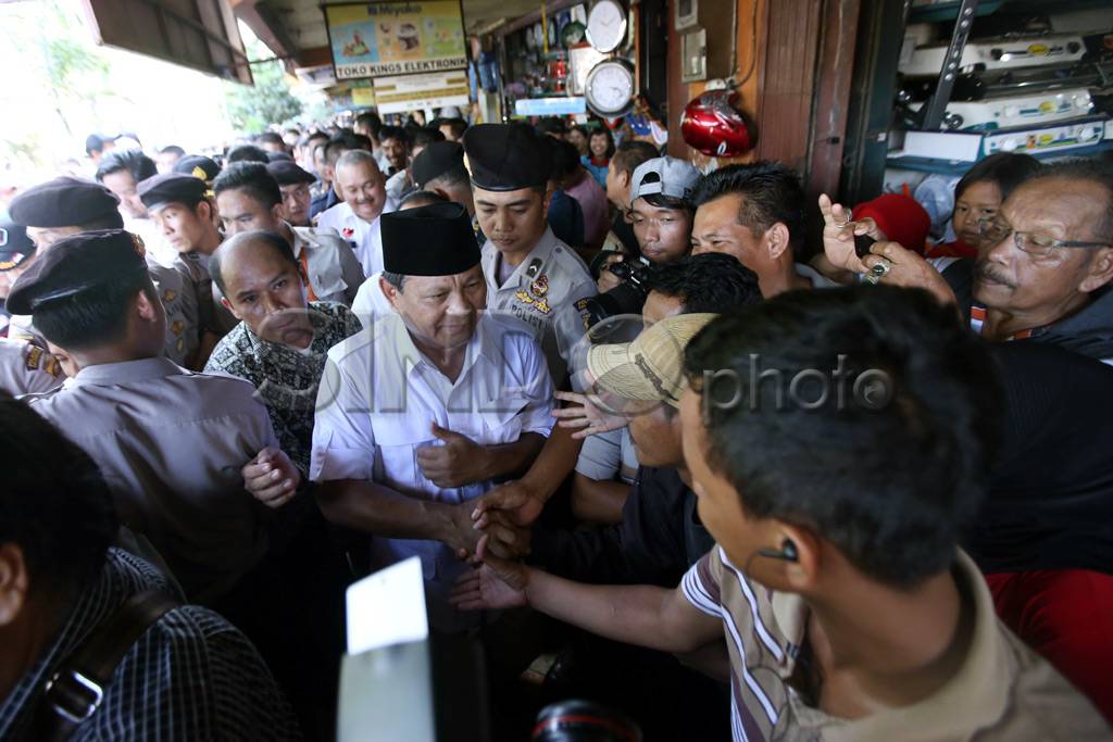 Pedagang Pasar Tradisional...