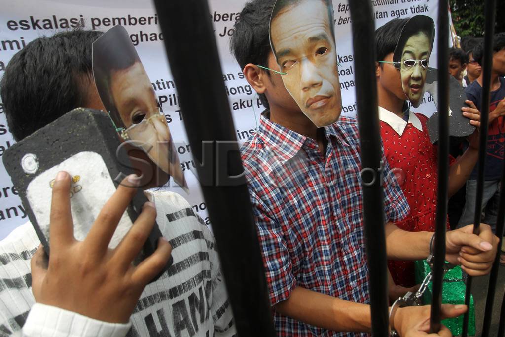 Unjuk Rasa Tuntut Pengusutan...