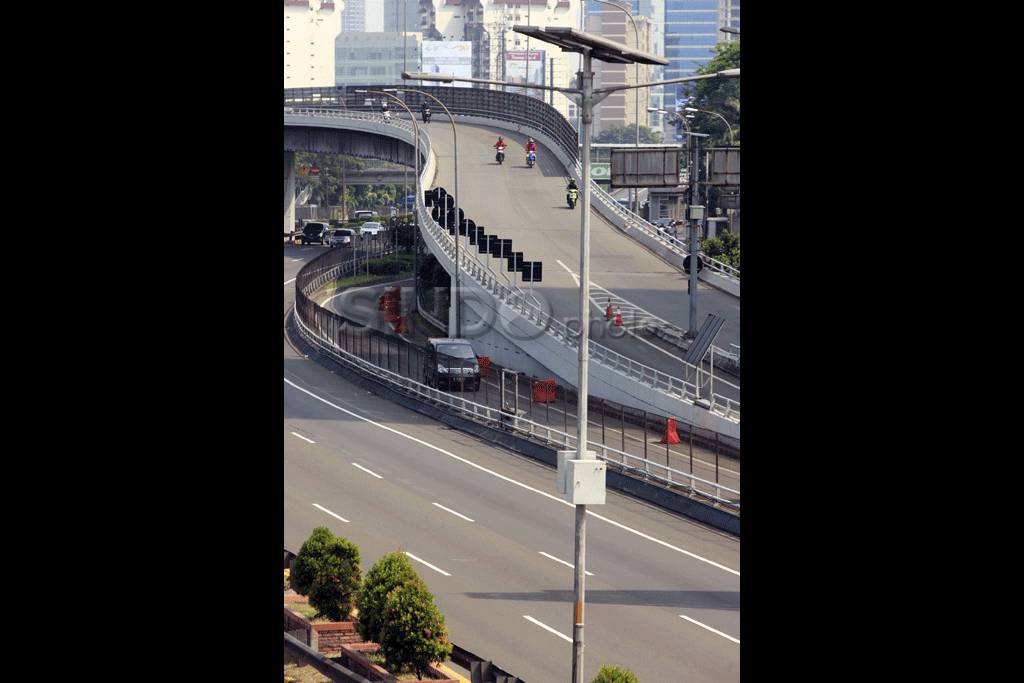 Warga Jakarta Nyoblos,...