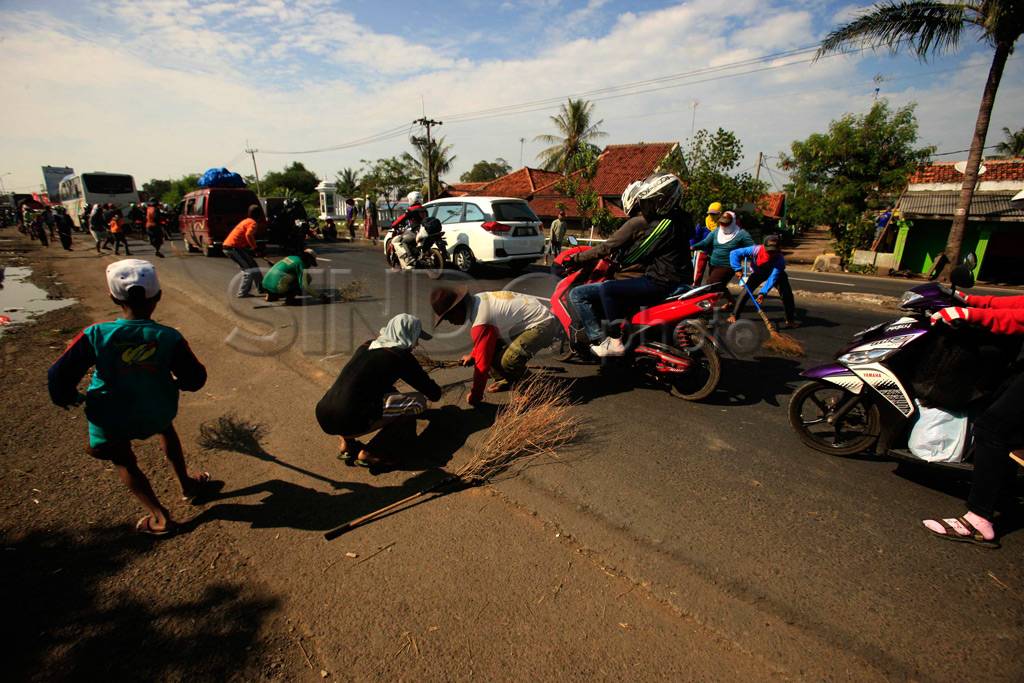 Penyapu Uang Koin di...