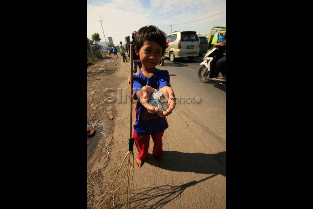 Penyapu Uang Koin di...