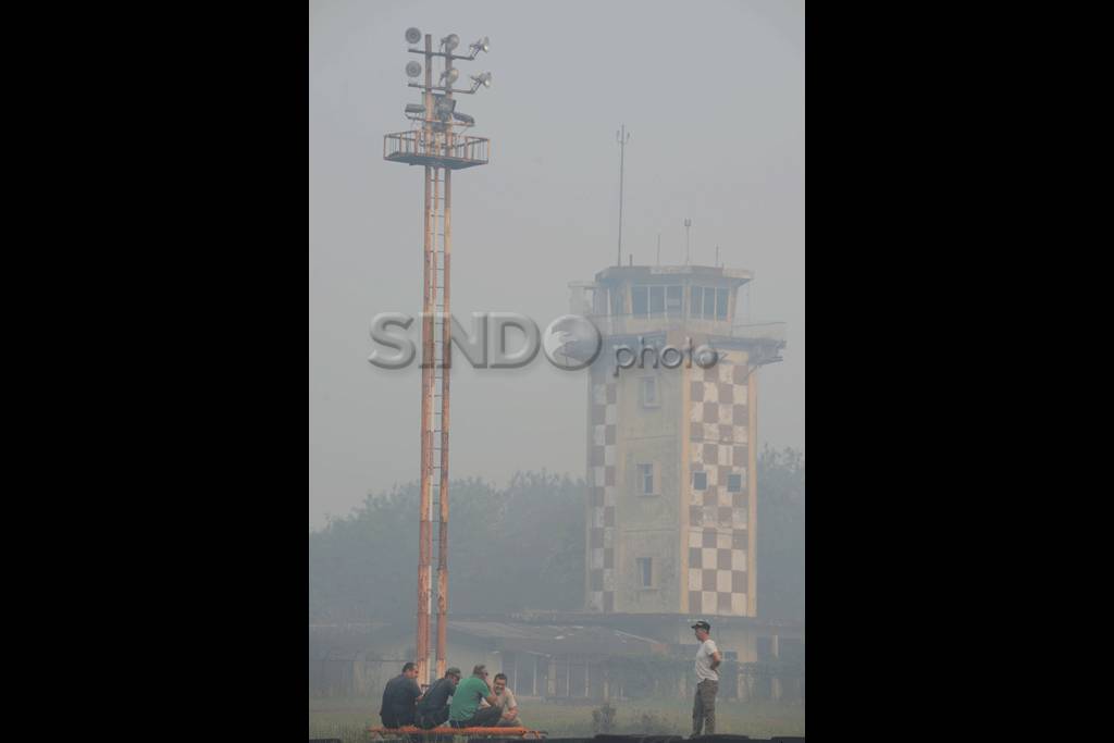Kabut Asap Ganggu Penerbangan...