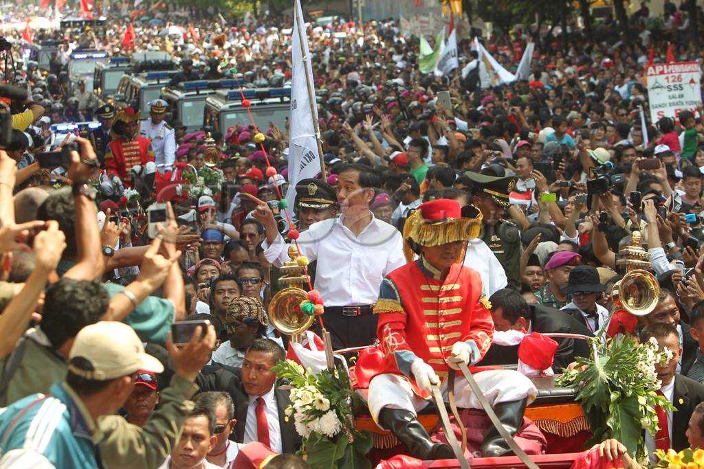 Singsingkan Lengan Jokowi-JK...