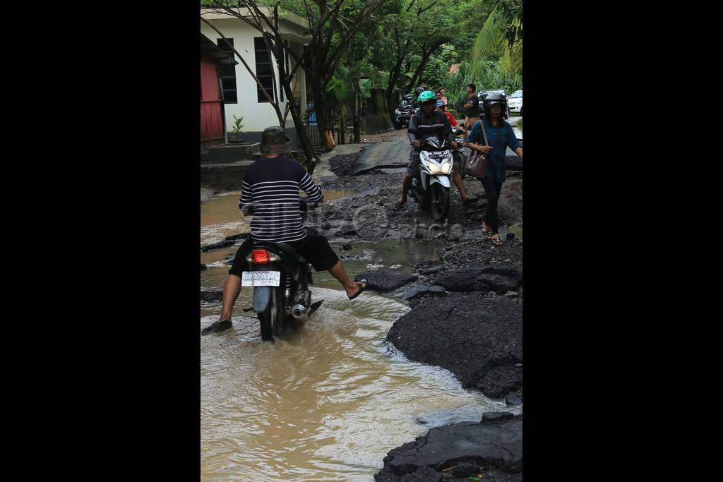 Banjir dan Longsor di...