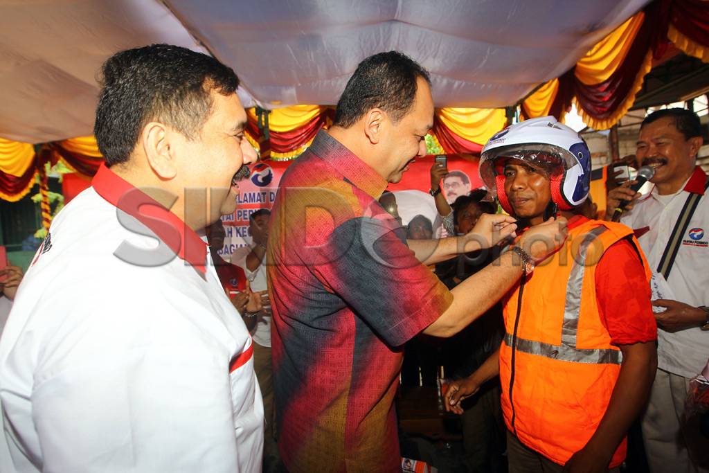 Perindo Bagikan Helm...