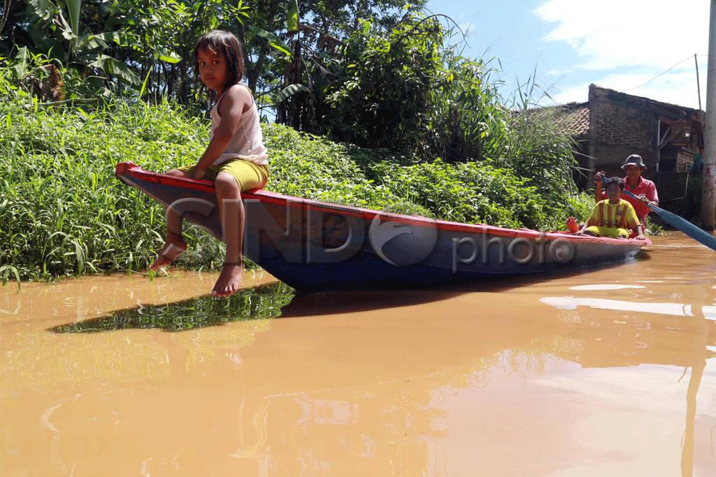 Banjir Kembali Genangi...