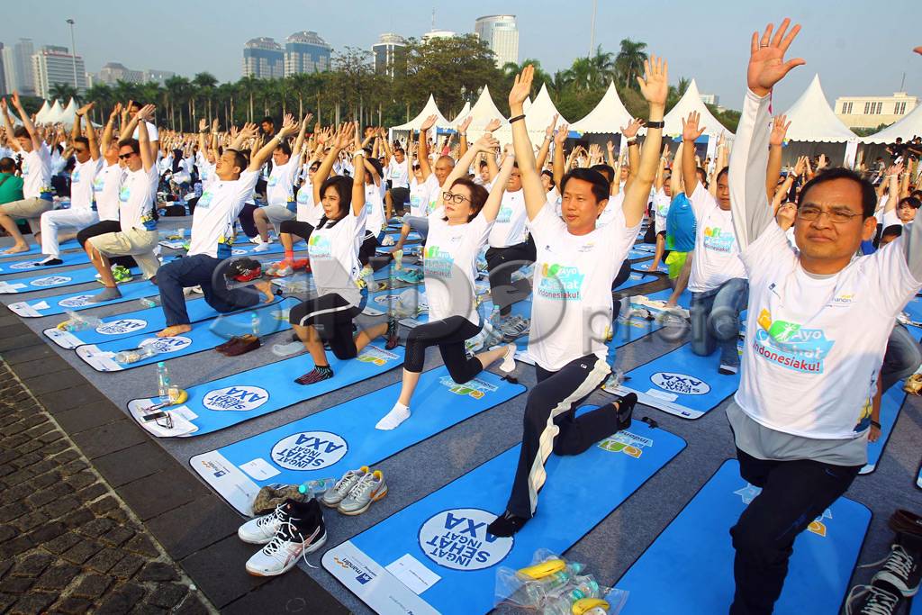AXA Mandiri Yoga Tiga...