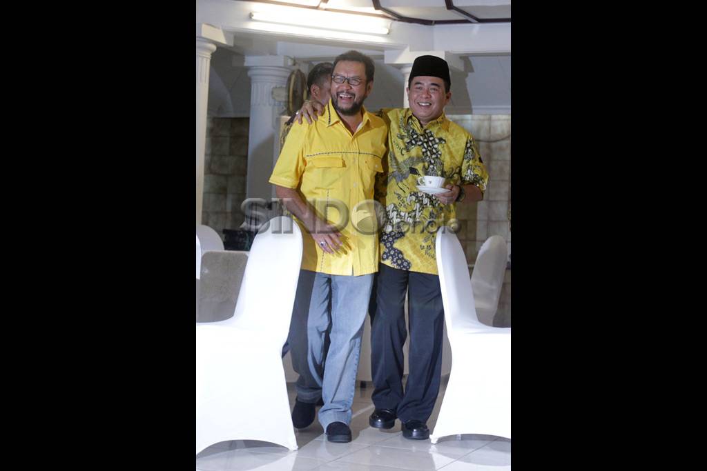Senyum Ical dan Agung...