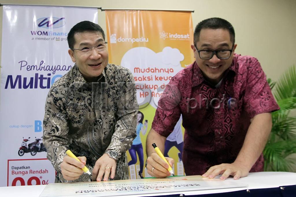 Indosat dan WOM Finance...
