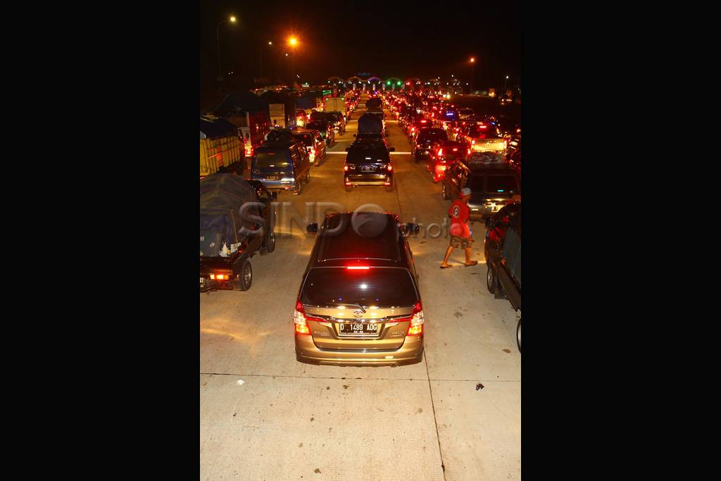 Pemudik Truk Bak Terbuka...