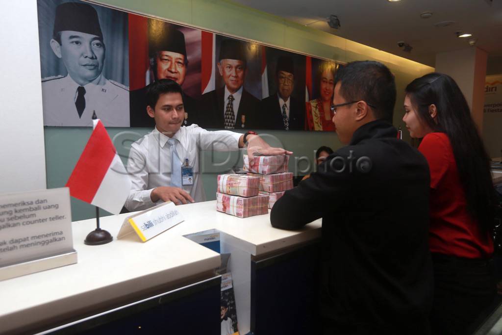 Rupiah Anjlok di Rp...